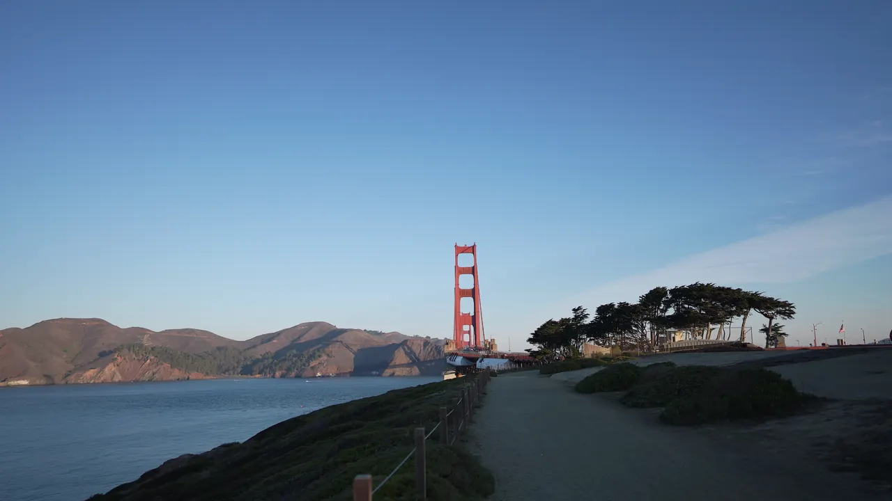The Golden Gate Bridge from the coastal path in the Presidio, early morning.